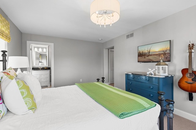 425 Carpenters Pt, Wayzata, MN 55391 - bedroom with carpet, baseboards, and ensuite bathroom