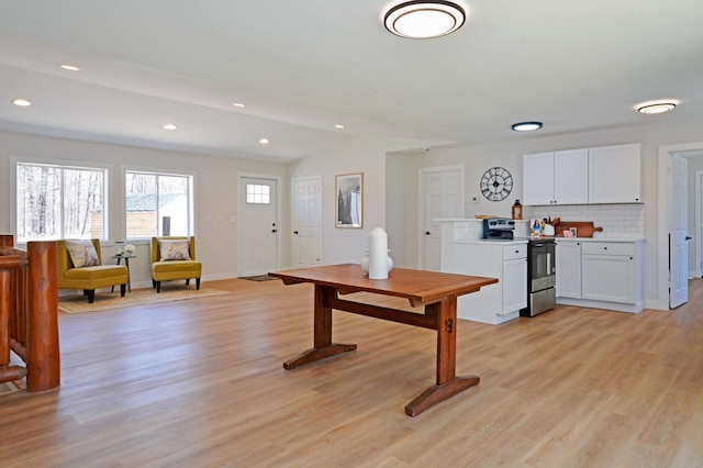 14113 260th St, Dailey Twp, MN 56353 - recreation room with light wood-style floors, baseboards, recessed lighting, and lofted ceiling