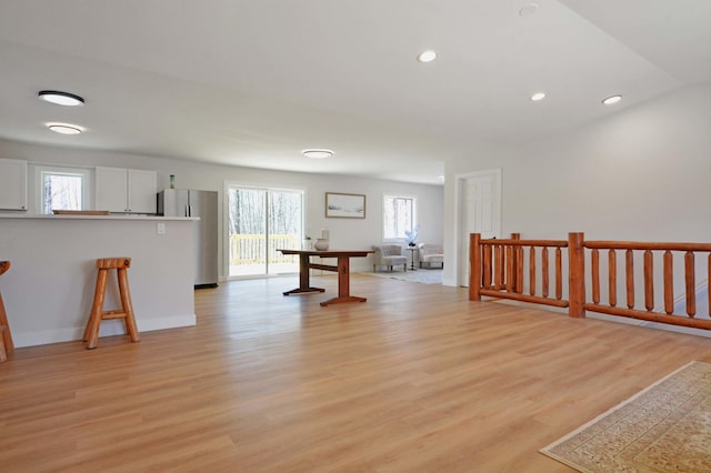 14113 260th St, Dailey Twp, MN 56353 - recreation room with healthy amount of natural light, light wood-type flooring, recessed lighting, and baseboards