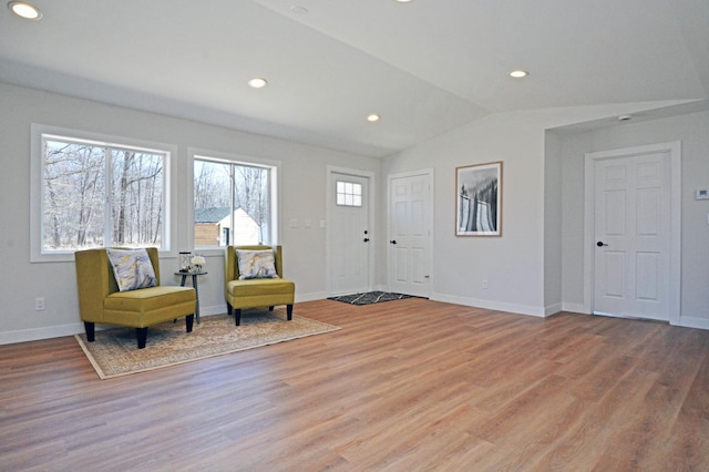 14113 260th St, Dailey Twp, MN 56353 - entryway with light wood-type flooring, lofted ceiling, baseboards, and recessed lighting