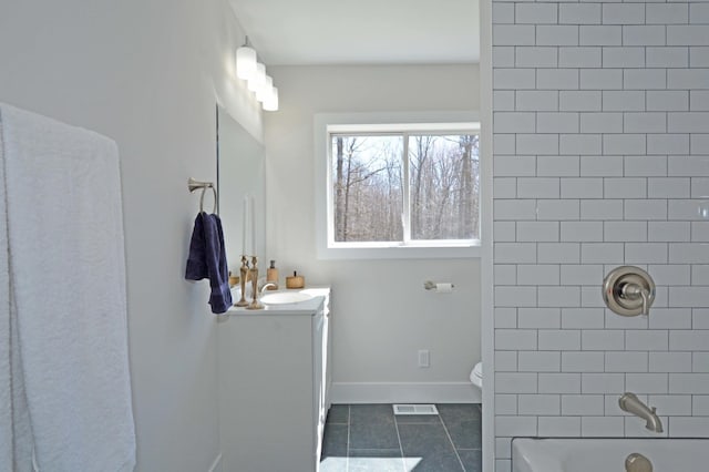 14113 260th St, Dailey Twp, MN 56353 - full bath with vanity, tile patterned flooring, toilet, bathtub / shower combination, and baseboards