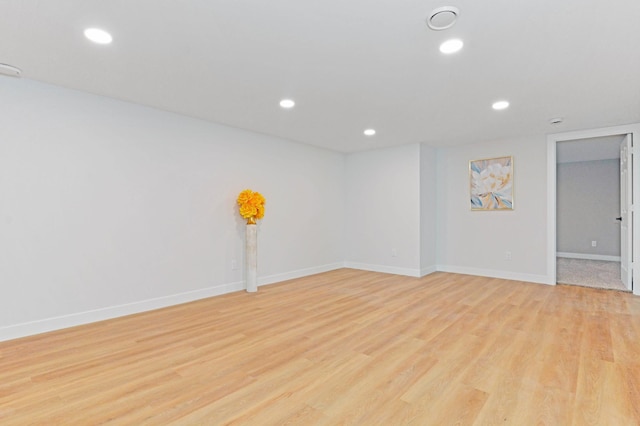 14113 260th St, Dailey Twp, MN 56353 - unfurnished room with light wood-style flooring, recessed lighting, and baseboards