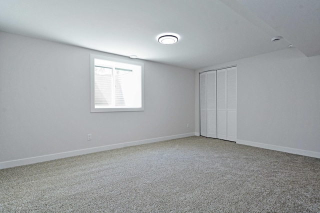 14113 260th St, Dailey Twp, MN 56353 - unfurnished bedroom featuring carpet floors, a closet, and baseboards