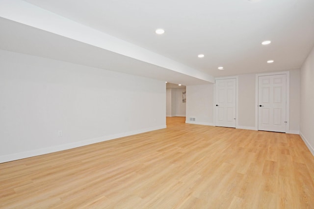 14113 260th St, Dailey Twp, MN 56353 - unfurnished room with baseboards, recessed lighting, and light wood-style flooring