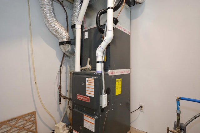 14113 260th St, Dailey Twp, MN 56353 - utility room with heating unit