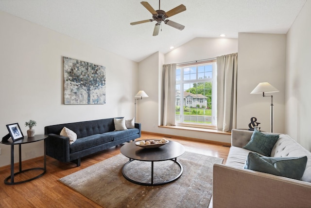 4562 Hummingbird Trl NE, Prior Lake, MN 55372 - living area featuring wood finished floors, vaulted ceiling, ceiling fan, baseboards, and recessed lighting
