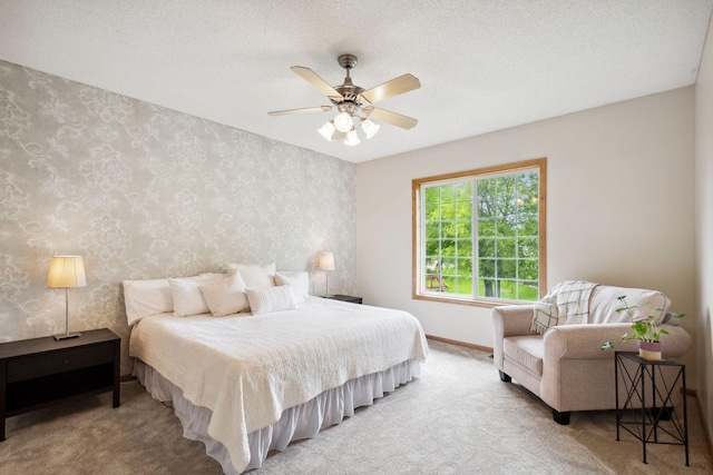4562 Hummingbird Trl NE, Prior Lake, MN 55372 - carpeted bedroom featuring wallpapered walls, baseboards, and ceiling fan