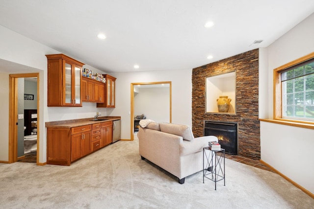 4562 Hummingbird Trl NE, Prior Lake, MN 55372 - living area featuring light carpet, a fireplace, recessed lighting, and baseboards