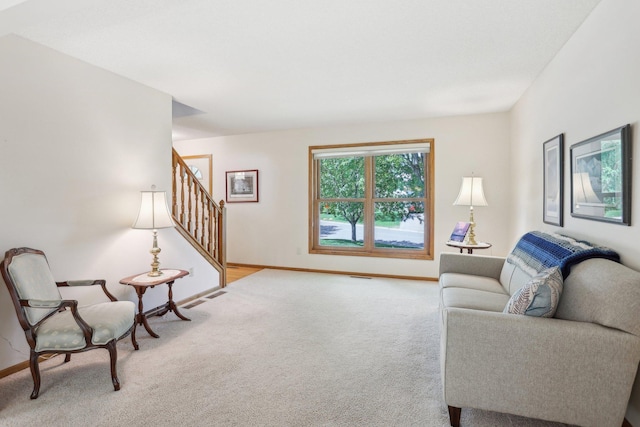 8671 Pheasant Run Rd, Woodbury, MN 55125 - living area with carpet flooring, stairway, and baseboards