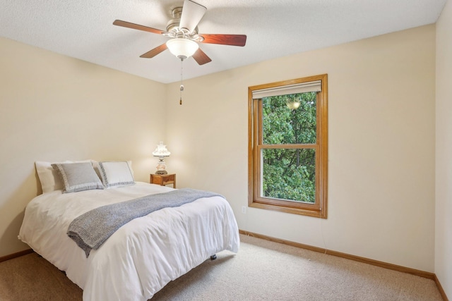 8671 Pheasant Run Rd, Woodbury, MN 55125 - carpeted bedroom with baseboards and a ceiling fan