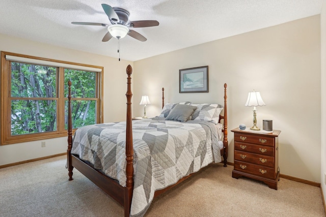 8671 Pheasant Run Rd, Woodbury, MN 55125 - bedroom featuring light colored carpet, baseboards, ceiling fan, and a textured ceiling