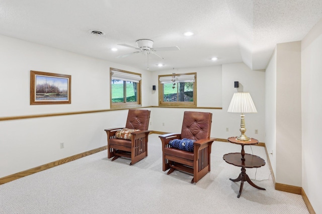8671 Pheasant Run Rd, Woodbury, MN 55125 - living area featuring light carpet, baseboards, recessed lighting, and ceiling fan