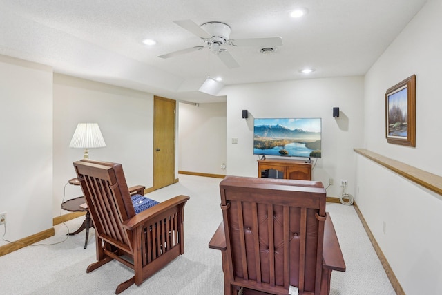 8671 Pheasant Run Rd, Woodbury, MN 55125 - living area featuring light carpet, recessed lighting, baseboards, and ceiling fan