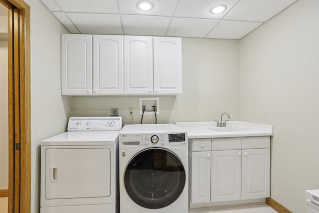 8671 Pheasant Run Rd, Woodbury, MN 55125 - laundry room with washing machine and dryer, cabinet space, baseboards, and recessed lighting
