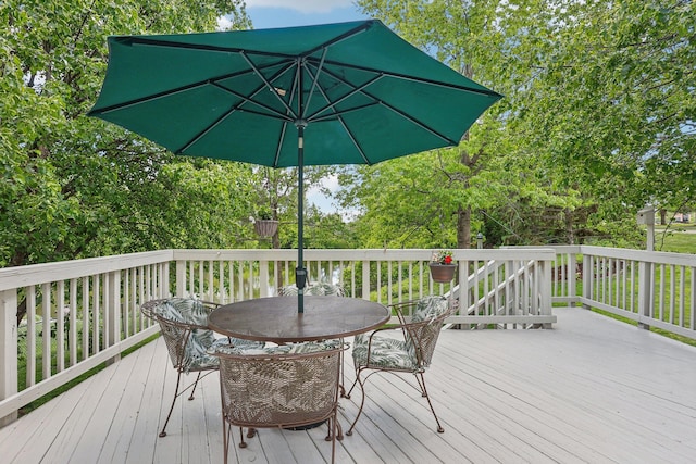 8671 Pheasant Run Rd, Woodbury, MN 55125 - wooden deck featuring outdoor dining area