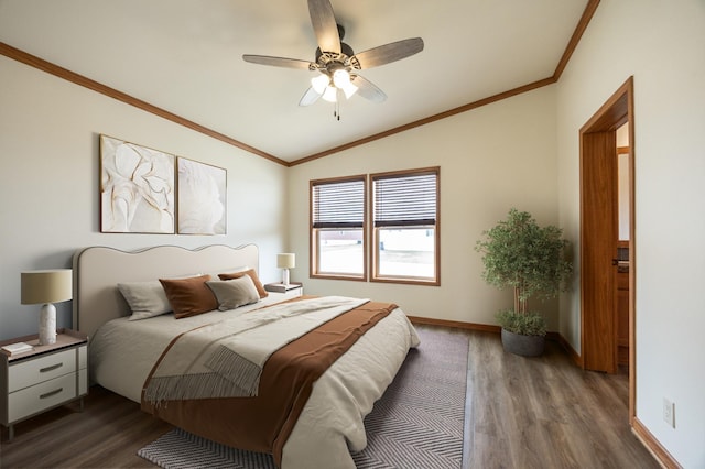 bedroom with dark wood-type flooring, crown molding, and vaulted ceiling