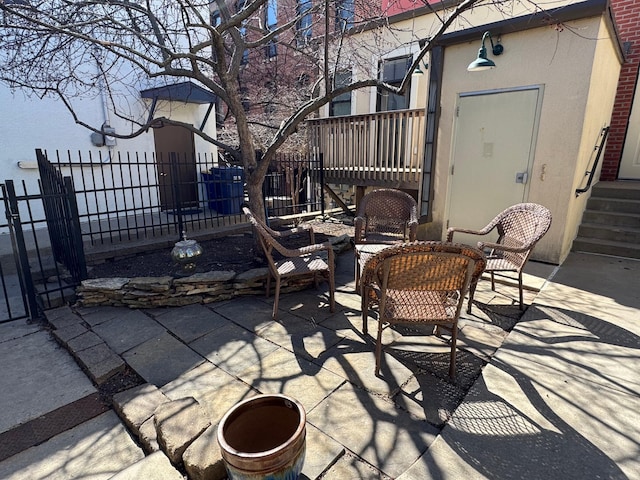 view of patio / terrace with fence