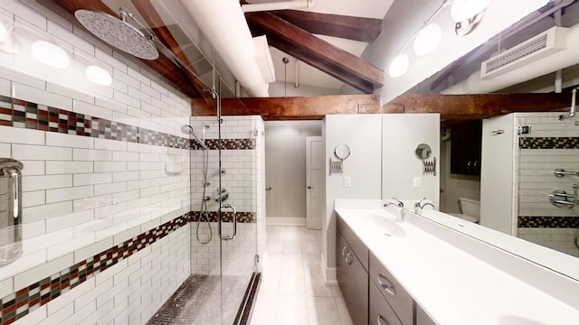 full bathroom featuring beam ceiling, a sink, and a stall shower