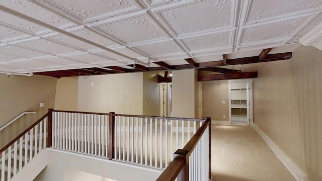 421 Division St S Unit 5, Northfield, MN 55057 - hallway featuring baseboards and an upstairs landing