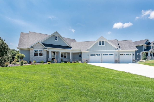 1005 Applewood Ct, Mankato, MN 56001 - view of front of house with a front yard, stone siding, and board and batten siding