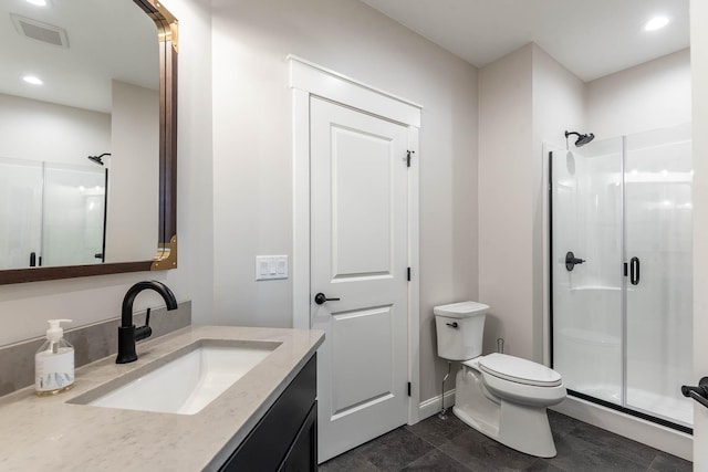 1005 Applewood Ct, Mankato, MN 56001 - full bath featuring toilet, vanity, a shower stall, and visible vents