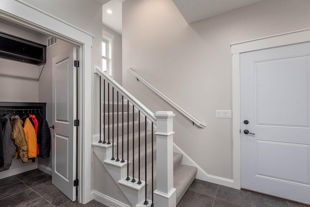 1005 Applewood Ct, Mankato, MN 56001 - staircase featuring tile patterned floors, recessed lighting, baseboards, and visible vents