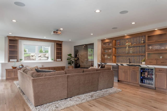 1005 Applewood Ct, Mankato, MN 56001 - living area with recessed lighting, indoor bar, light wood-style floors, and beverage cooler