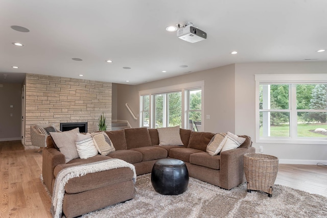 1005 Applewood Ct, Mankato, MN 56001 - living room featuring a fireplace, baseboards, light wood finished floors, and recessed lighting