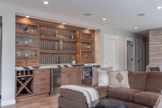 1005 Applewood Ct, Mankato, MN 56001 - bar with wet bar, light wood-type flooring, beverage cooler, built in features, and recessed lighting