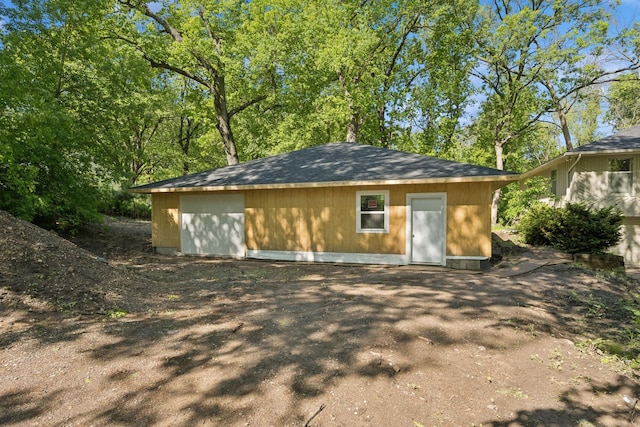 13907 Mcginty Rd E, Minnetonka, MN 55305 - view of outdoor structure with a garage