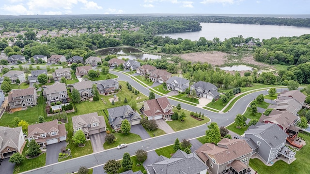 8831 Reflections Rd, Chanhassen, MN 55317 - aerial view of residential area with a nearby body of water