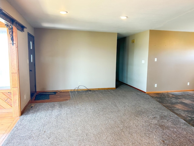 carpeted empty room with recessed lighting and baseboards