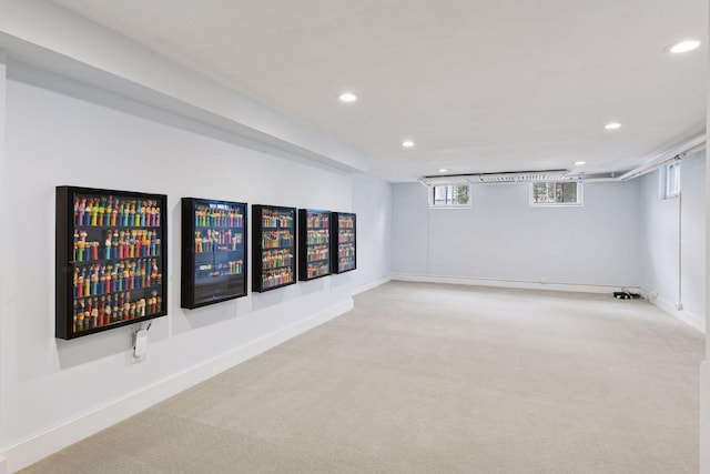 basement with carpet, recessed lighting, and baseboards