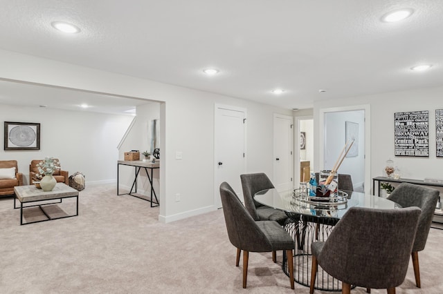10124 Arrowwood Trl, Woodbury, MN 55129 - dining space featuring light colored carpet, recessed lighting, and baseboards
