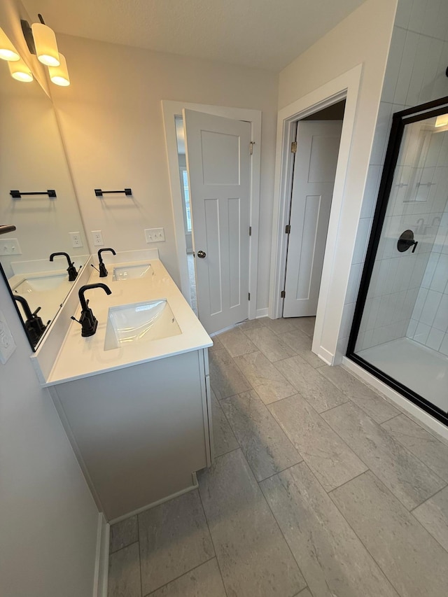 10124 Arrowwood Trl, Woodbury, MN 55129 - full bath with a stall shower, double vanity, and baseboards