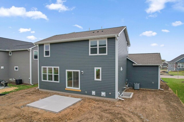 10124 Arrowwood Trl, Woodbury, MN 55129 - rear view of house featuring a patio area and central air condition unit