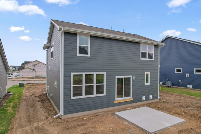 10124 Arrowwood Trl, Woodbury, MN 55129 - rear view of house with a patio and central AC