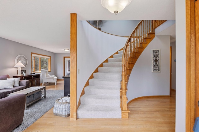 515 Greaton Rd, New Richmond, WI 54017 - stairs featuring wood finished floors