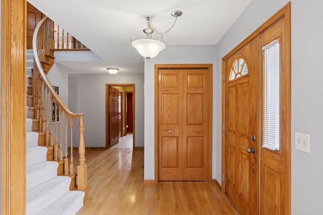 515 Greaton Rd, New Richmond, WI 54017 - entrance foyer featuring light wood finished floors and stairs