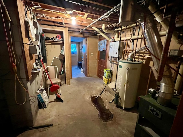 unfinished basement featuring water heater