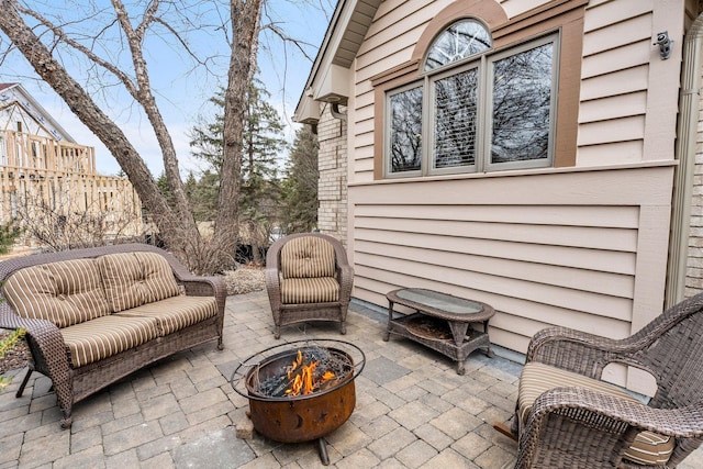 13162 Glenhaven Ave, Apple Valley, MN 55124 - view of patio / terrace featuring an outdoor fire pit
