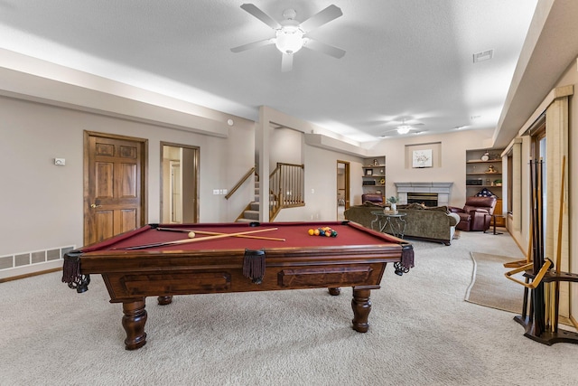 13162 Glenhaven Ave, Apple Valley, MN 55124 - recreation room with ceiling fan, carpet flooring, and a fireplace