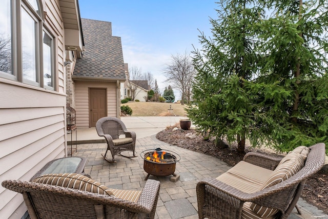 13162 Glenhaven Ave, Apple Valley, MN 55124 - view of patio featuring an outdoor fire pit