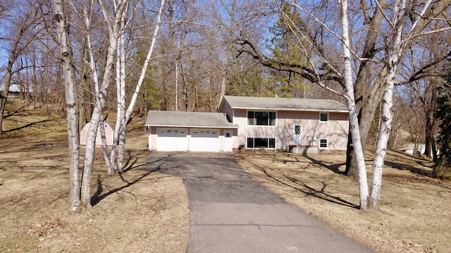 18045 Delaware Ln, Eden Lake Twp, MN 56362 - bi-level home featuring driveway and a garage