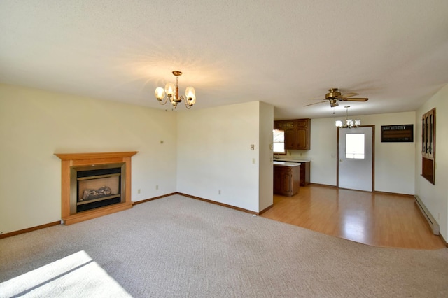 18045 Delaware Ln, Eden Lake Twp, MN 56362 - unfurnished living room featuring a chandelier, light carpet, a baseboard radiator, a fireplace, and baseboards
