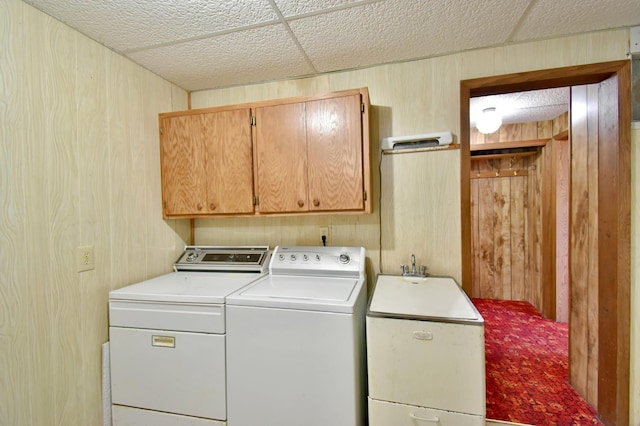 18045 Delaware Ln, Eden Lake Twp, MN 56362 - washroom with washer and dryer, cabinet space, and wooden walls