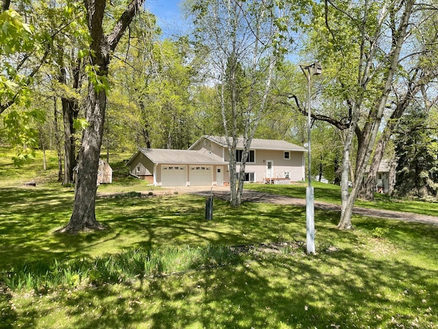 18045 Delaware Ln, Eden Lake Twp, MN 56362 - view of front of property with a front lawn, driveway, and an attached garage