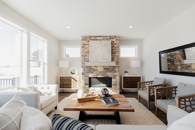 10155 Arrowwood Trl, Woodbury, MN 55129 - living room featuring wood finished floors, a fireplace, and recessed lighting