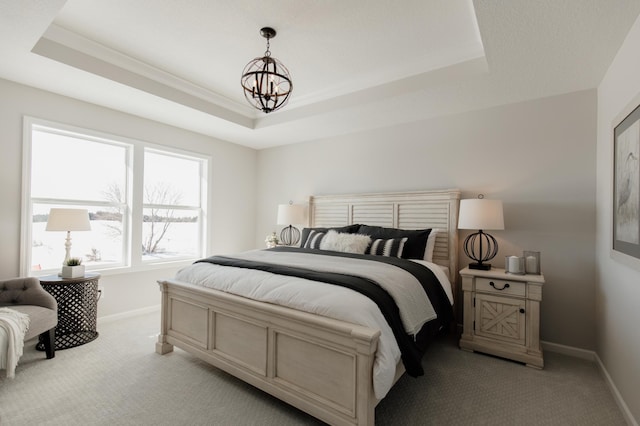 10155 Arrowwood Trl, Woodbury, MN 55129 - bedroom featuring light carpet, a tray ceiling, a chandelier, baseboards, and crown molding