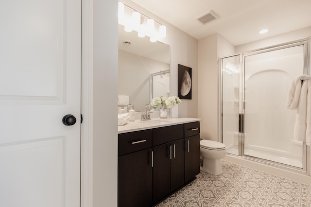 10155 Arrowwood Trl, Woodbury, MN 55129 - full bath with vanity, a shower stall, and toilet
